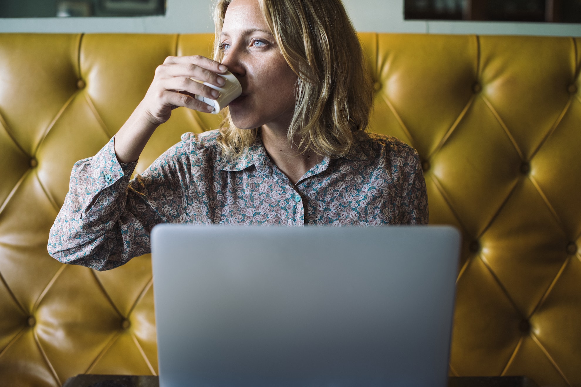 woman learning on her laptop SEO