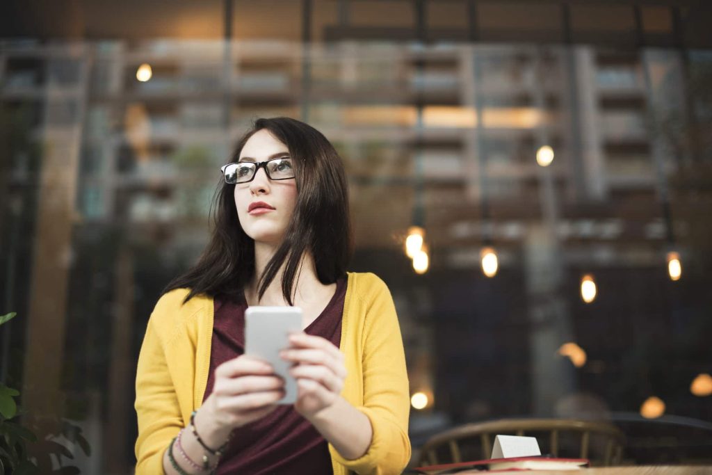 woman using mobile phone-SSL Certificate