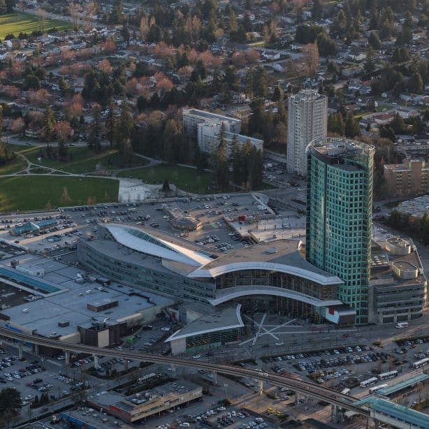 Aerial view on the Shopping Mall, Bus Station and Univercity. Surrey, Vancouver, British Columbia, Canada